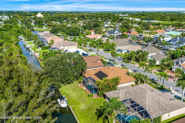 aerial view with a residential view and a water view