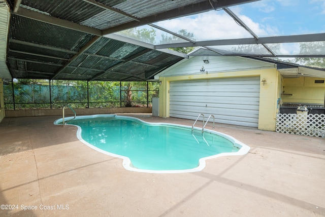 view of pool featuring a patio and a lanai