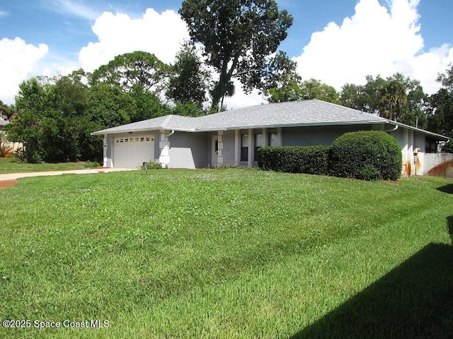 single story home with a garage and a front yard