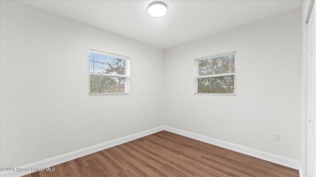 empty room featuring hardwood / wood-style floors