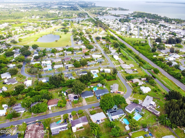 drone / aerial view featuring a water view