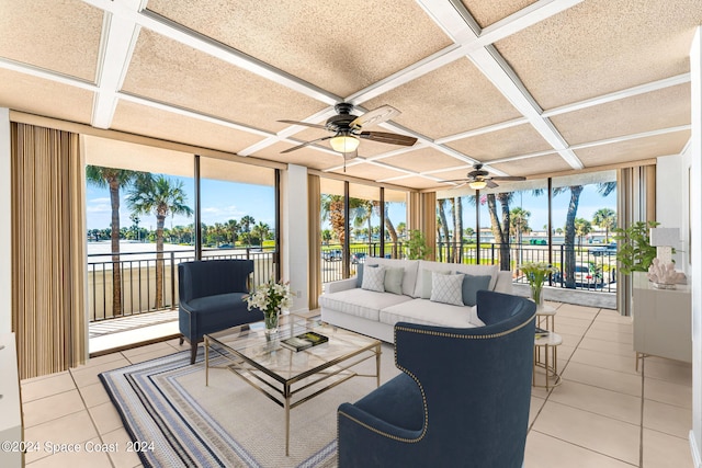 sunroom / solarium featuring coffered ceiling and ceiling fan