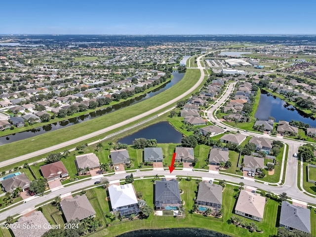 drone / aerial view featuring a water view