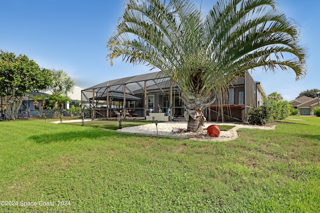 view of yard with a lanai