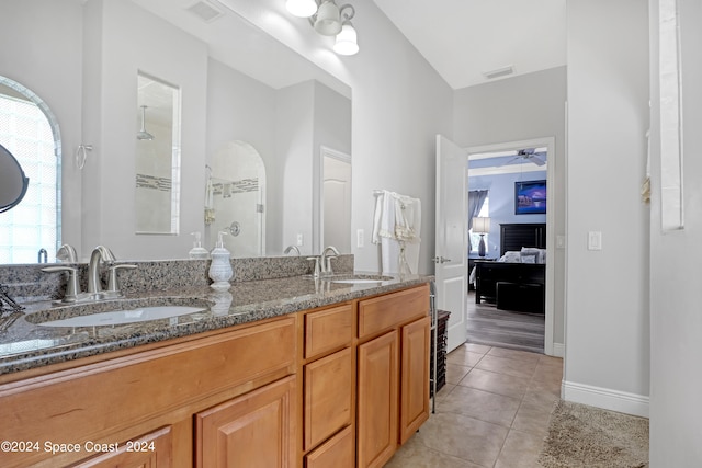 bathroom with vanity, tile patterned floors, walk in shower, and ceiling fan