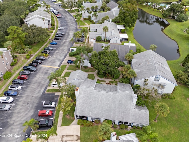 drone / aerial view with a water view