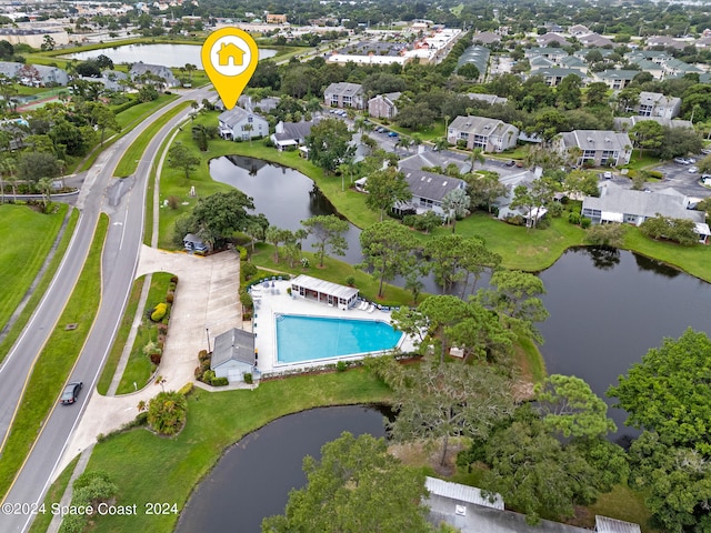 birds eye view of property featuring a water view