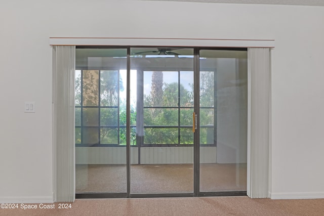 entryway featuring ceiling fan