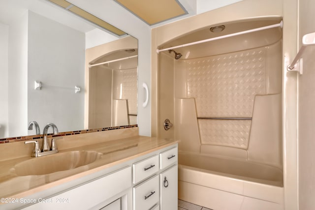 bathroom with vanity and shower / bathing tub combination