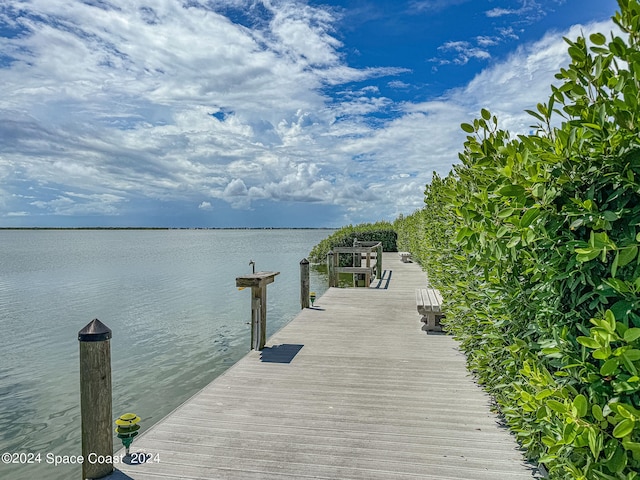 view of dock with a water view