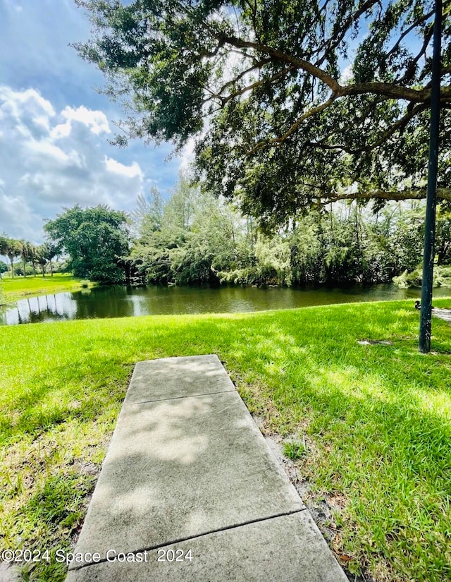 view of yard with a water view