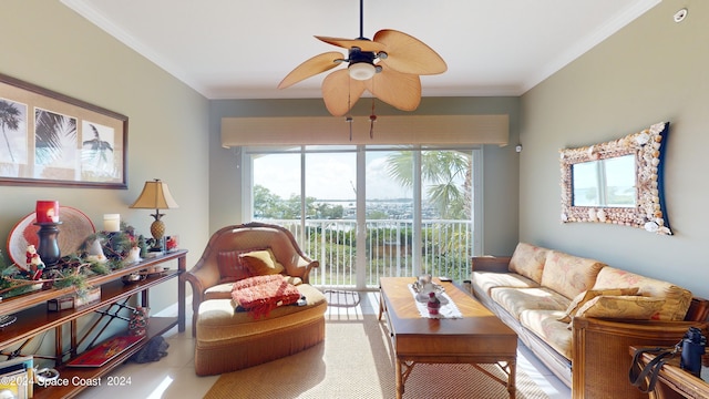 tiled living room with ceiling fan and crown molding