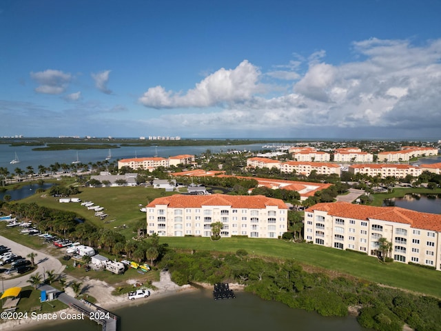 birds eye view of property featuring a water view