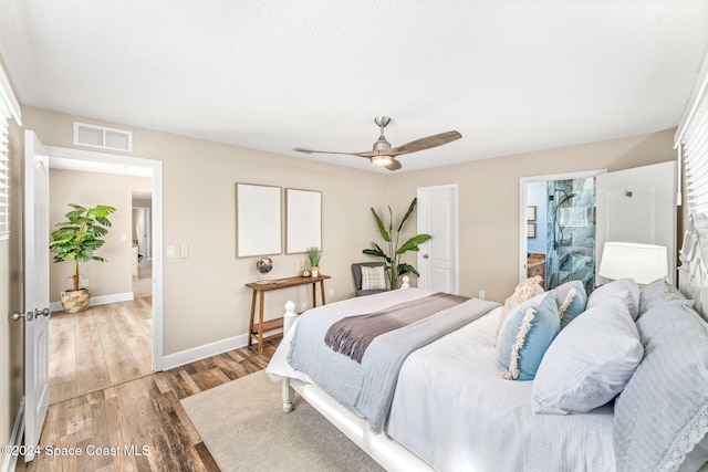 bedroom featuring ceiling fan and wood-type flooring