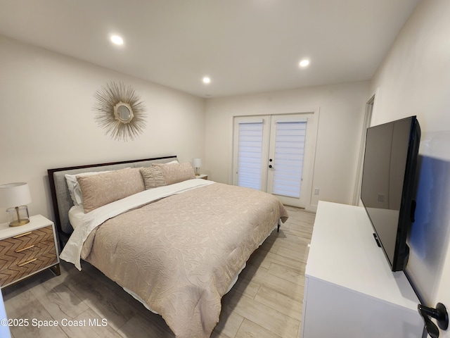 bedroom featuring access to exterior, recessed lighting, french doors, and light wood-style flooring