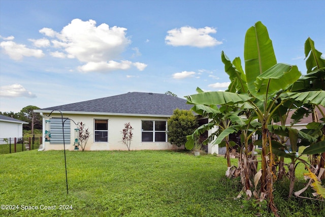 exterior space with a yard