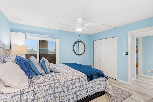 bedroom featuring a closet, ceiling fan, and light hardwood / wood-style flooring