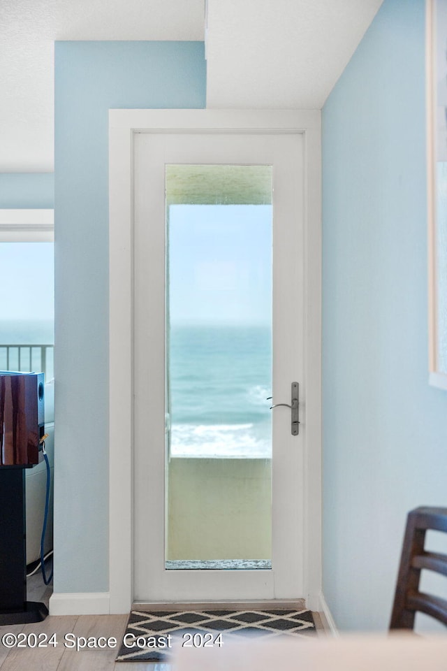 entryway featuring a water view