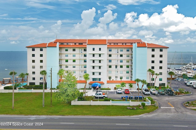 view of building exterior featuring a water view