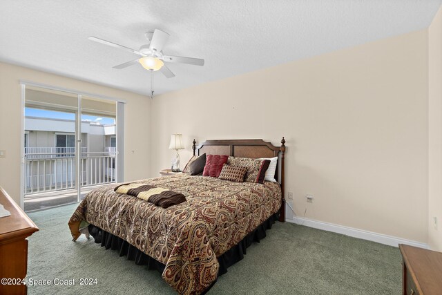 carpeted bedroom with a textured ceiling, access to exterior, and ceiling fan