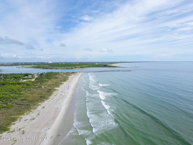 property view of water featuring a beach view