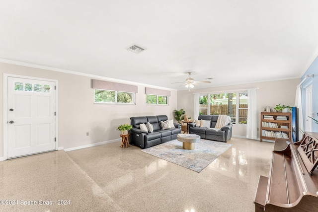 living room featuring crown molding and ceiling fan