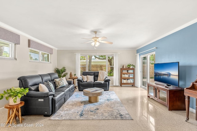 living room with ornamental molding, a healthy amount of sunlight, and ceiling fan