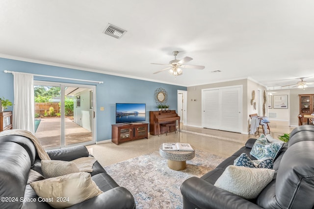 living room with ceiling fan and ornamental molding