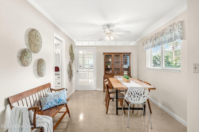 dining room featuring ornamental molding and ceiling fan