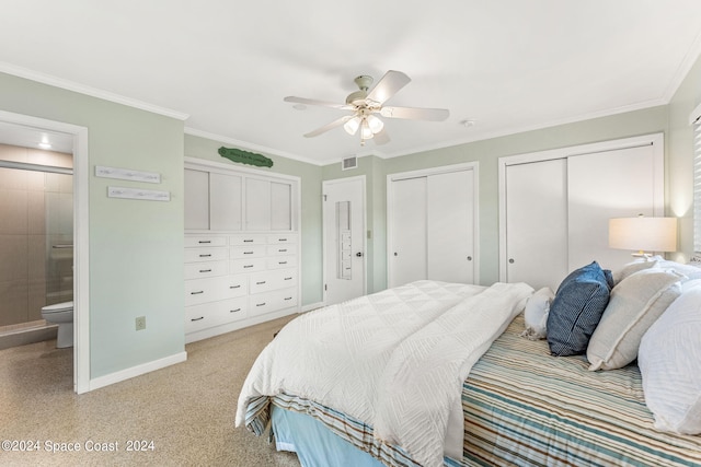 bedroom with two closets, ceiling fan, connected bathroom, and ornamental molding