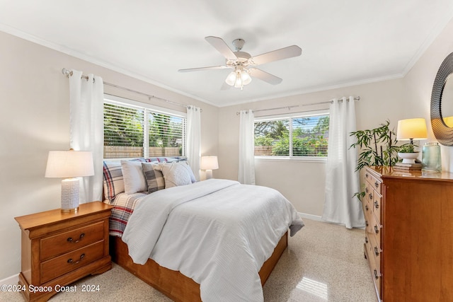 bedroom featuring ceiling fan and ornamental molding