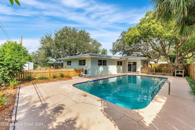 view of pool with a patio area