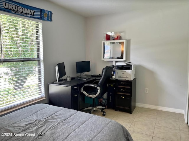 tiled bedroom with multiple windows