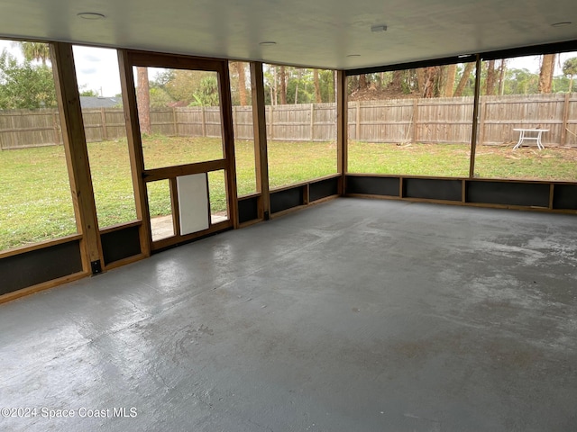 unfurnished sunroom featuring plenty of natural light