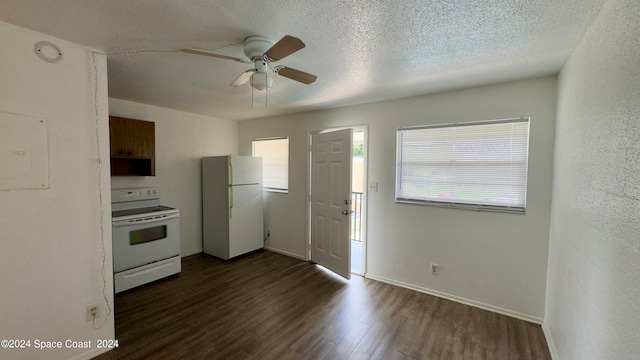 kitchen with dark wood-type flooring, white appliances, a textured ceiling, and ceiling fan