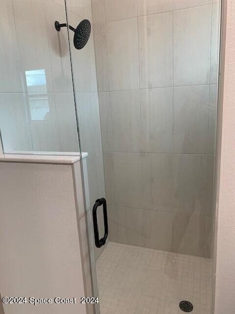 bathroom featuring walk in shower