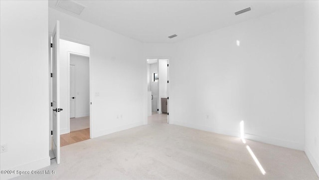 566 Hamy St, Palm Bay, FL 32908 - spare room with light carpet and baseboards