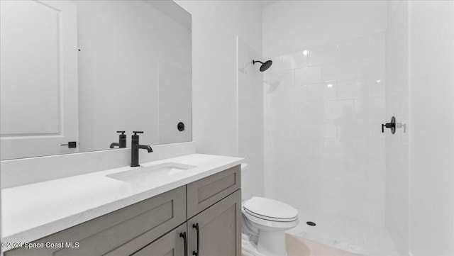 566 Hamy St, Palm Bay, FL 32908 - full bath with toilet, vanity, and tiled shower
