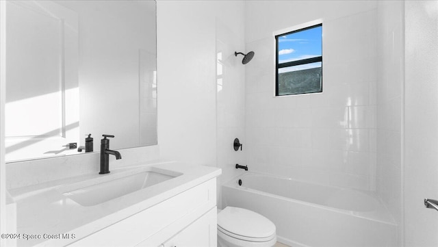 full bathroom with vanity, toilet, and tiled shower / bath combo