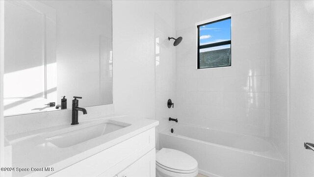 566 Hamy St, Palm Bay, FL 32908 - full bath with vanity, toilet, and shower / washtub combination
