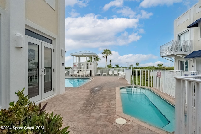 view of pool with a patio area