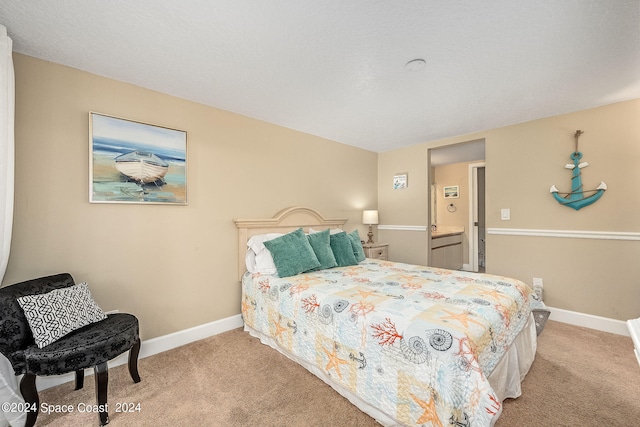 carpeted bedroom with a textured ceiling