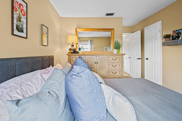 bedroom with a textured ceiling