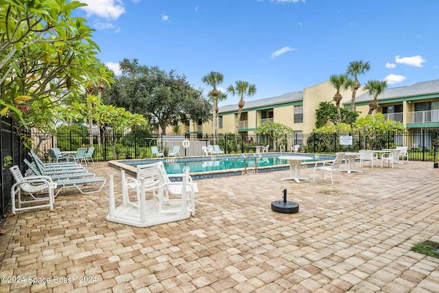 view of pool with a patio area