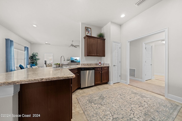 kitchen featuring dishwasher, kitchen peninsula, sink, ceiling fan, and dark brown cabinetry