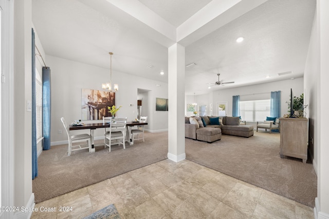 living room with ceiling fan with notable chandelier and light carpet