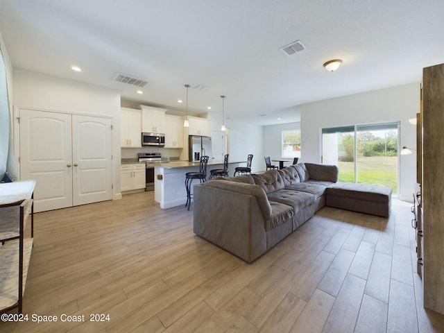 living room with light wood-type flooring