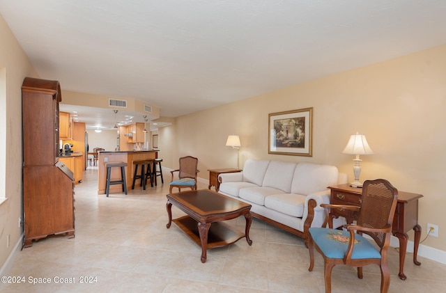 living room featuring light tile patterned floors