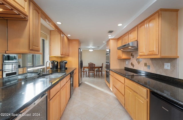 kitchen with black appliances, light tile patterned floors, sink, decorative backsplash, and dark stone counters