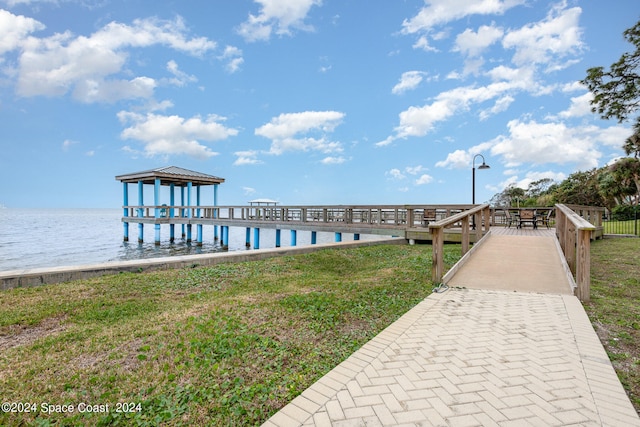 dock area featuring a gazebo and a water view